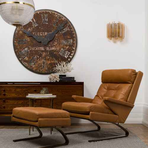 tan brown leather armchair with footstool