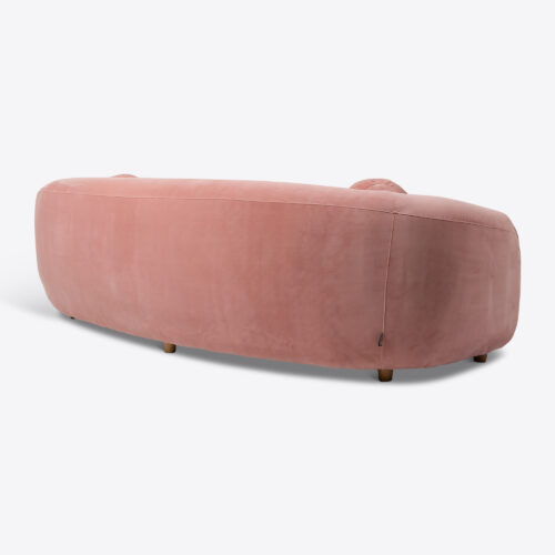curved sofa in pink velvet