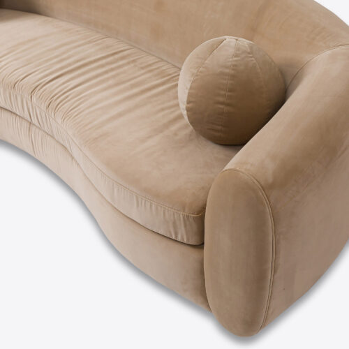 curved sofa in beige velvet