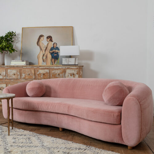 pink velvet curved sofa by Pure White Lines