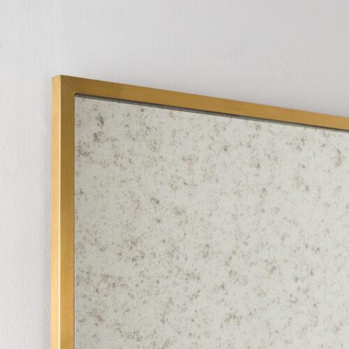 stealth mirror with aged glass and brass frame