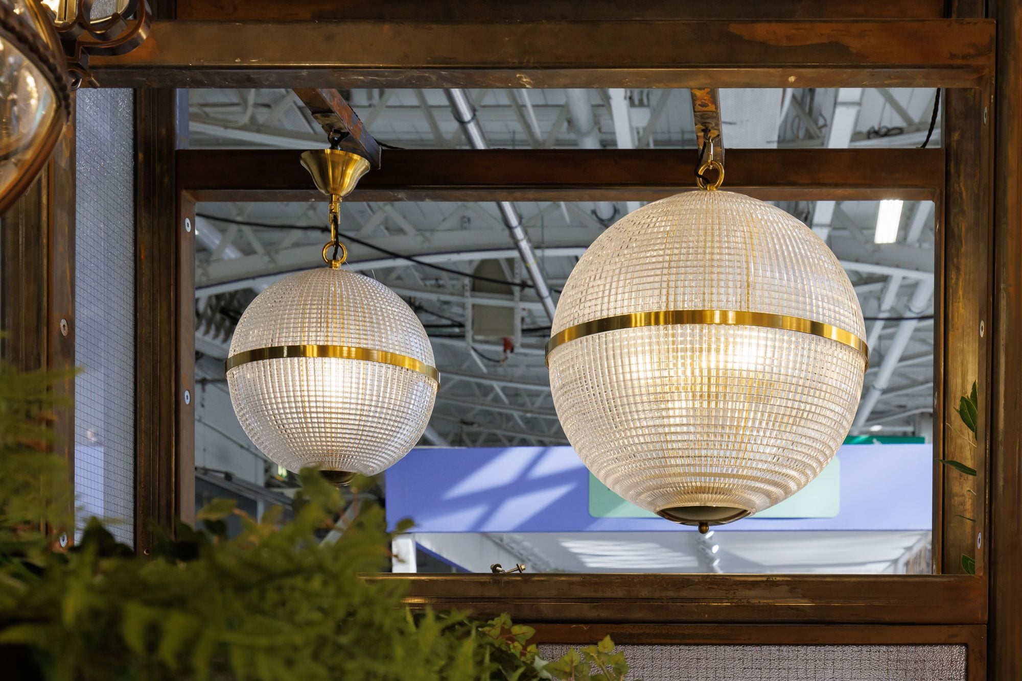 Decorex 2022 best stand winner Pure White Lines - Parisian globe lights - Holophane inspired