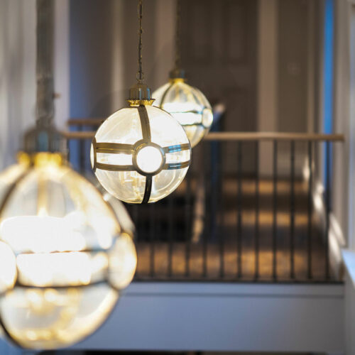 Tilehouse Studio - luxury interior design home countries country manor house - Georgian renovation - hanging globe lanterns in stairwell