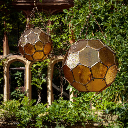 Amber Architectural geometric lantern with amber glass forms part of our collaborative collection with Parnham Park and renowned collector, James Perkins