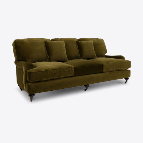 Baxter sofa - a traditional sofa on castors and upholstered in moss green coloured velvet