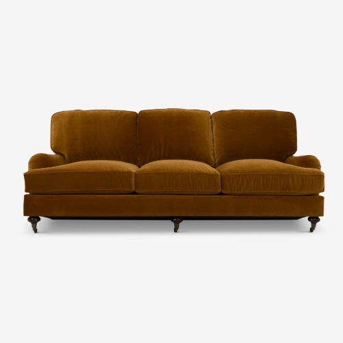 Baxter sofa - a traditional sofa on castors and upholstered in mustard coloured velvet