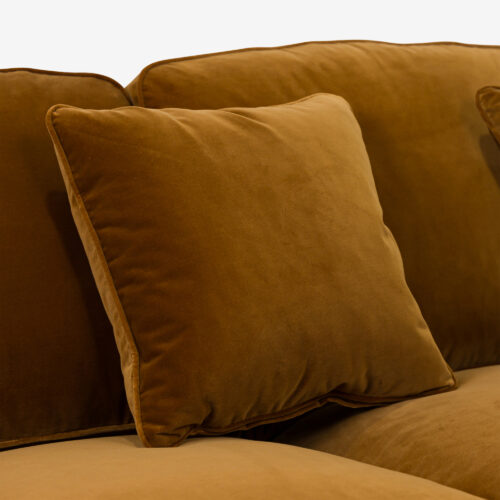 Baxter sofa - a traditional sofa on castors and upholstered in mustard coloured velvet
