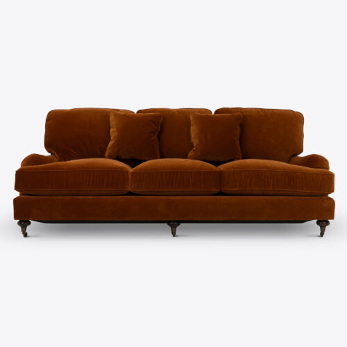 Baxter sofa - a traditional sofa on castors and upholstered in rust coloured velvet