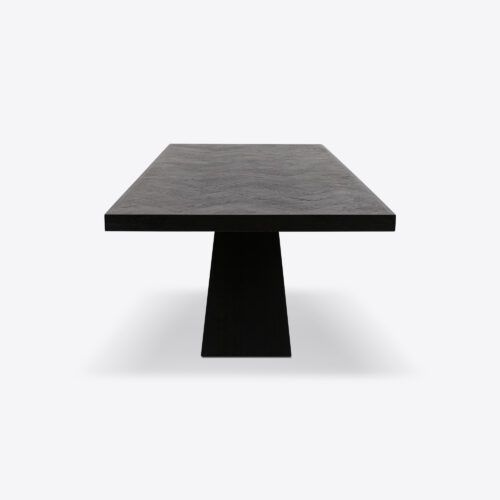Lourdes black oak dining table - sculptural modernist brutalist