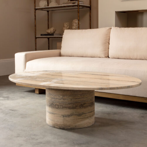 Argent travertine solid coffee table in an oval shape