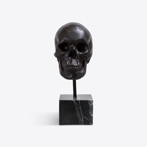 solid brass skull sulpture ornament on marble stand