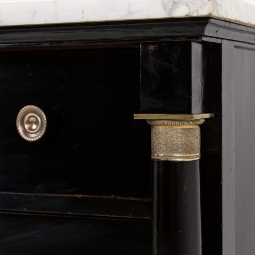 A 19th century French Empire style marble top commode, made from beautiful ebonised wood