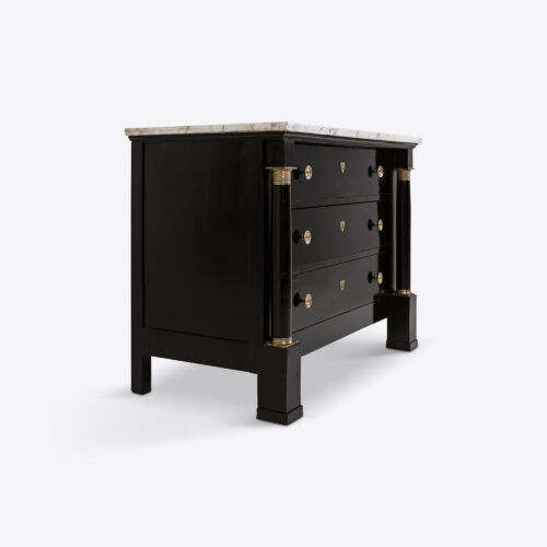 A 19th century French Empire style marble top commode, made from beautiful ebonised wood
