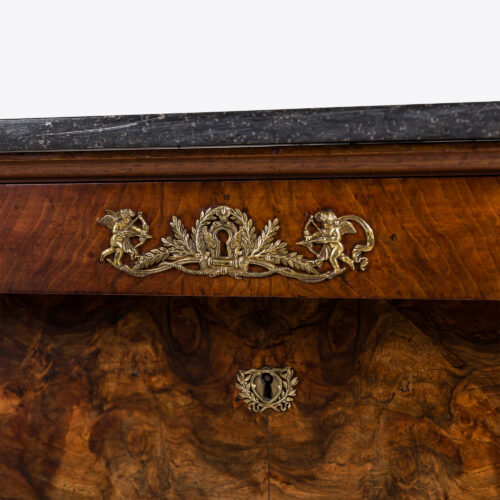 A 19th century French Empire style marble top commode, made from beautiful flamed walnut wood.
