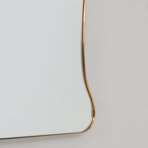hourglass mid-century Italian style mirror with brass frame