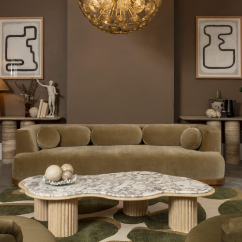 Sofas in a living room with superb amber chandelier and Italian marble coffee table